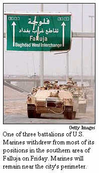 [ U.S. troops withdraw from Falluja after recalling Saddam era Iraqi general to quell uprising ]