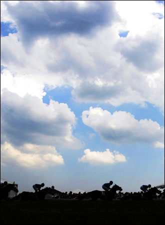 [ Preakness horse race, 2004 - not Magritte's 'Empire of Light' painting ]