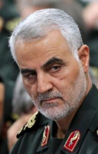 Iran's by Iranian propaganda widely revered military leader and chief military strategist until killed per text at left, General Qassim Suleimani).